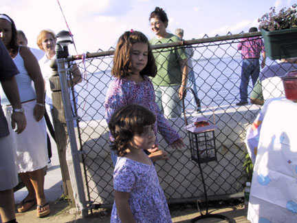 Lydia escorts Maddie back into the yard.