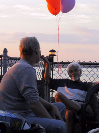 The grandfathers park it to enjoy the sunset.