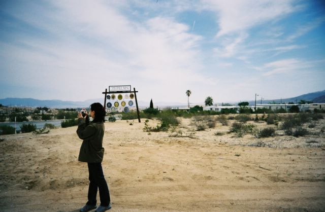 Solmi takes a picture of the road.